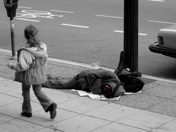 Man_sleeping_on_Canadian_sidewalk